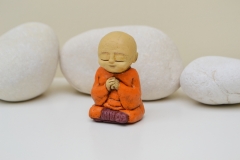 Wakei_-_orange_monk_sculpture_serene_spiritual_praying_meditation_meditation_buddhist