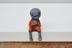 Zeno_extraterrestrial_zen_sculpture_sitting_shelf_creature_robe_alien_cute_cropped
